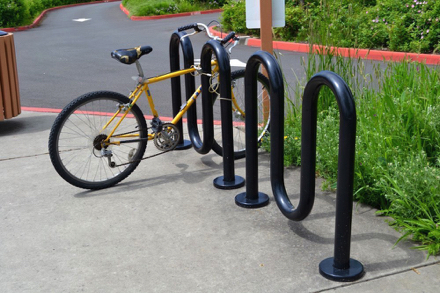 Bike rack located on the sidewalk off parking lot - bikes are not allowed on any trail Bike rack located on the sidewalk off parking lot - bikes are not allowed on any trail